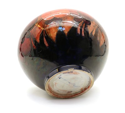 Lot 60 - A William Moorcroft pottery Flambe ‘Wisteria’ pattern vase