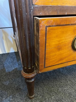 Lot 492 - A Louis XVI satinwood and mahogany commode