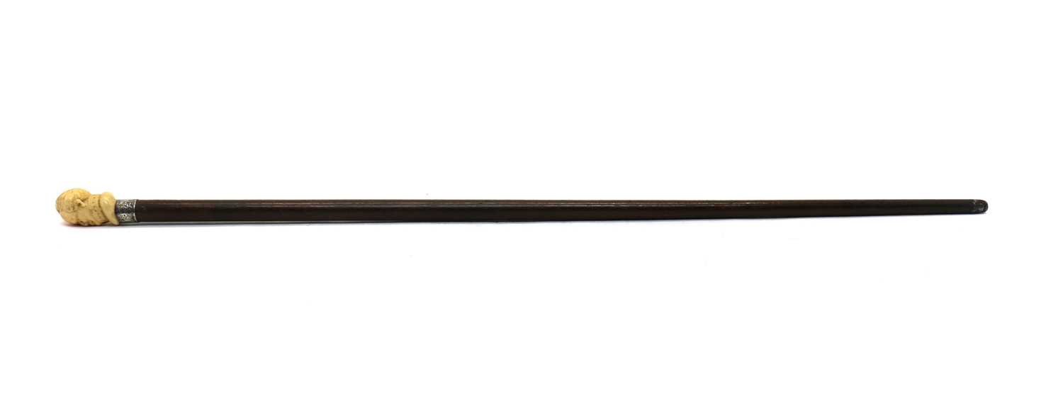 Lot 317 - An ivory mounted mahogany walking cane