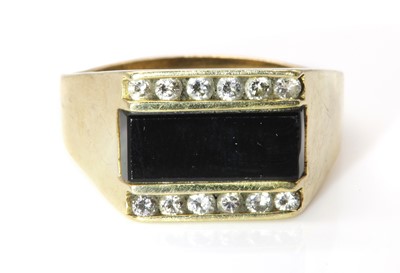 Lot 341 - An American gold onyx and diamond signet ring