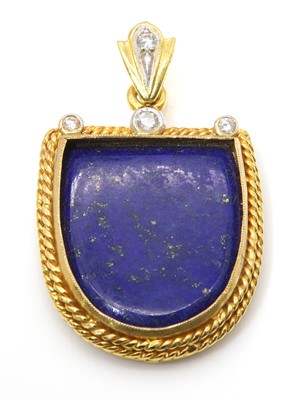 Lot 281 - A gold lapis lazuli and diamond pendant