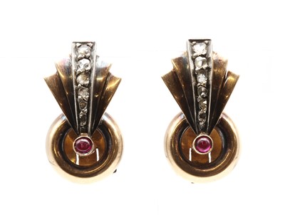 Lot 69 - A pair of Continental gold ruby and diamond clip earrings, c.1940