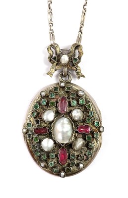 Lot 135 - An Austro-Hungarian gem set oval hinged locket, c.1930