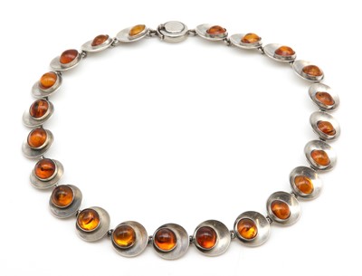 Lot 233 - A Danish sterling silver and amber necklace, by Niels Erik From