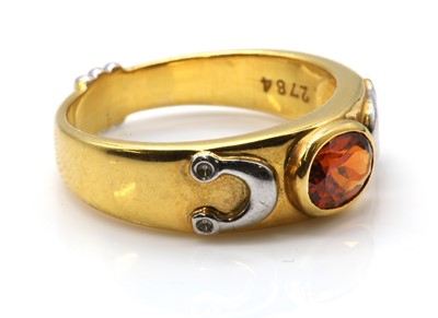 Lot 278 - A gold single stone garnet 'Rahu' ring, by Astral Gemstone Talismans