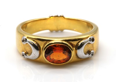 Lot 278 - A gold single stone garnet 'Rahu' ring, by Astral Gemstone Talismans