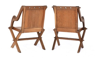 Lot 33 - A pair of oak Glastonbury chairs