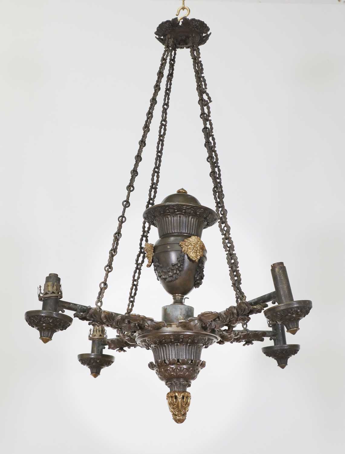 Lot 47 - A William IV bronze and parcel-gilt colza oil chandelier