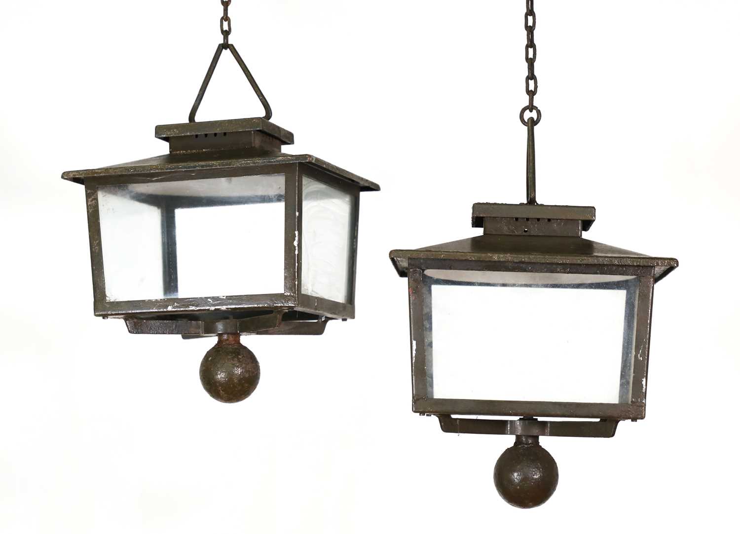 Lot 210 - A pair of iron exterior lanterns