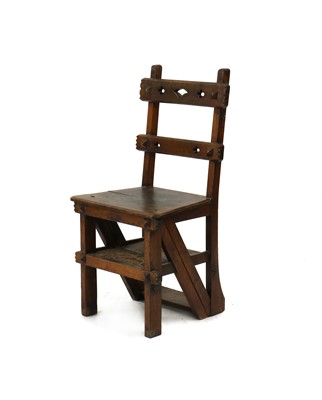 Lot 451 - A Victorian walnut metamorphic library chair