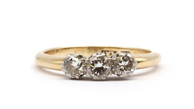Lot 89 - A gold three stone diamond ring