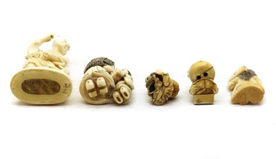 Lot 76 - A collection of ivory okimono