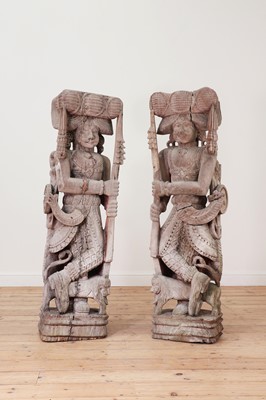 Lot 95 - A pair of hardwood figural architectural fragments