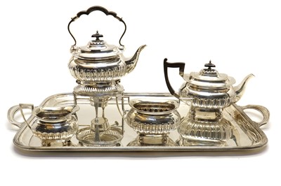 Lot 57 - A George V silver tea service