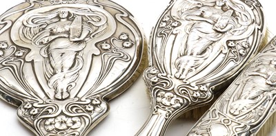 Lot 54 - An Art Nouveau silver mounted dressing table set