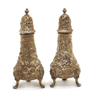 Lot 62 - A pair of American silver cast pepperettes