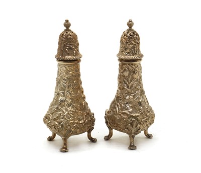 Lot 62 - A pair of American silver cast pepperettes