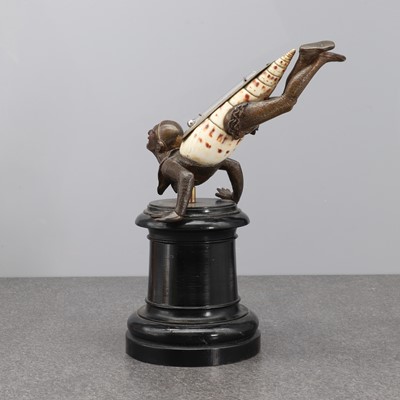 Lot 166 - An Art Deco bronze and conch shell thermometer