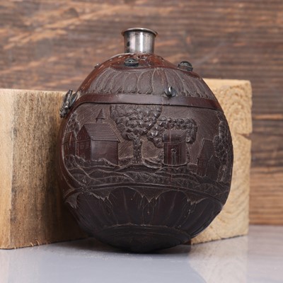 Lot 198 - A carved 'bugbear' coconut flask