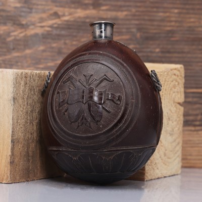 Lot 198 - A carved 'bugbear' coconut flask