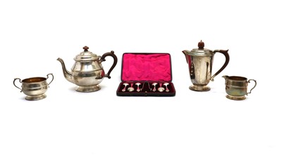 Lot 55 - A 1930s silver four piece composite tea service