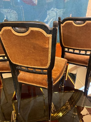 Lot 7 - A set of four Aesthetic ebonised chairs
