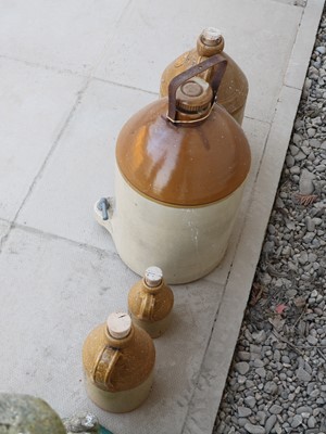 Lot 468 - A collection of four stoneware cider jars