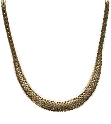 Lot 83 - A 9ct three colour gold brick link necklace