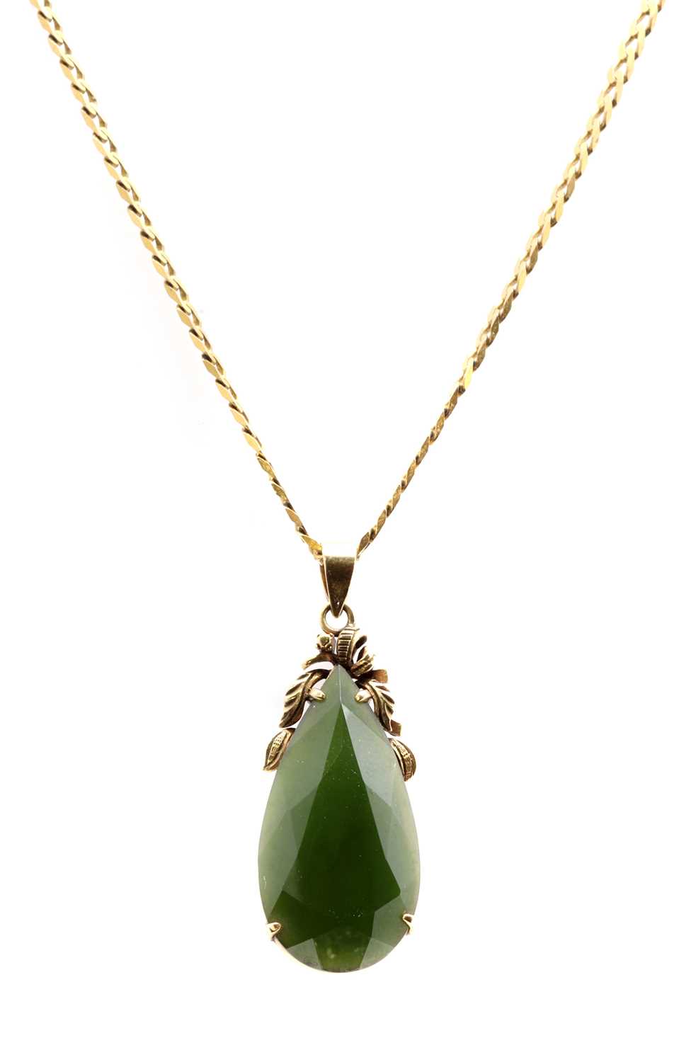 Lot 177 - A gold nephrite jade pendant