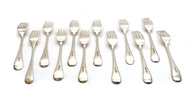 Lot 25 - A part canteen of George III and later silver cutlery