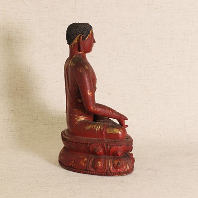 Lot 87 - A Chinese gilt lacquered wood Buddha