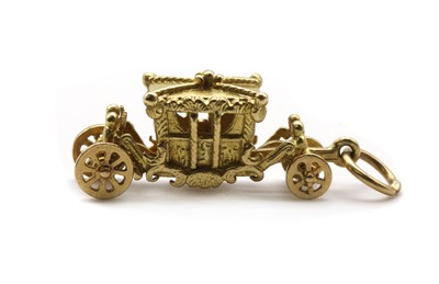 Lot 85 - An 18ct gold commemorative coronation carriage charm, by Cropp & Farr