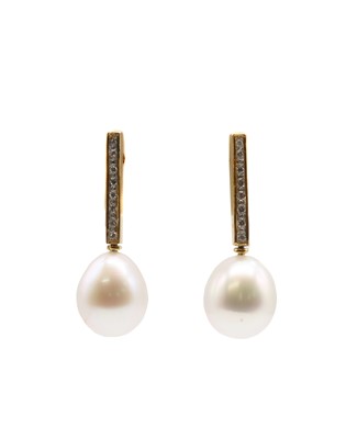 Lot 242 - A pair of gold cultured freshwater pearl and diamond drop earrings