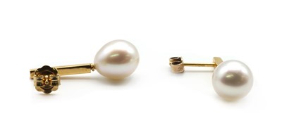 Lot 242 - A pair of gold cultured freshwater pearl and diamond drop earrings
