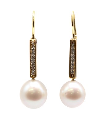 Lot 246 - A pair of gold cultured freshwater pearl and diamond drop earrings