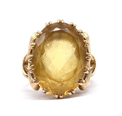 Lot 149 - A gold single stone citrine ring