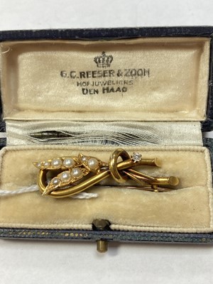 Lot 13 - A late Victorian gold split pearl and diamond spray brooch