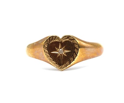 Lot 219 - A 9ct gold diamond set heart shaped signet ring
