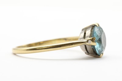 Lot 61 - A gold single stone blue zircon ring