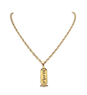 Lot 251 - A gold Egyptian hieroglyph cartouche pendant