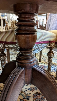Lot 391 - A George III mahogany triple pedestal dining table