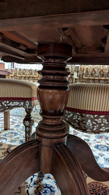 Lot 391 - A George III mahogany triple pedestal dining table