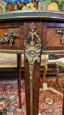 Lot 376 - A transitional-style kingwood and ormolu bijouterie table in the manner of François Linke