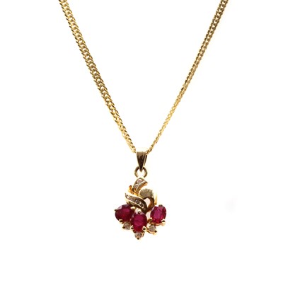 Lot 128 - A gold ruby and cubic zirconia pendant
