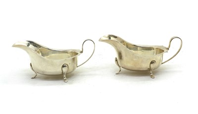 Lot 2 - A pair of silver sauceboats