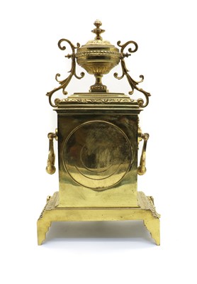Lot 139 - A late 19th century brass clock