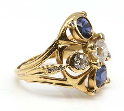 Lot 100 - An 18ct gold diamond and sapphire ring, c.1960