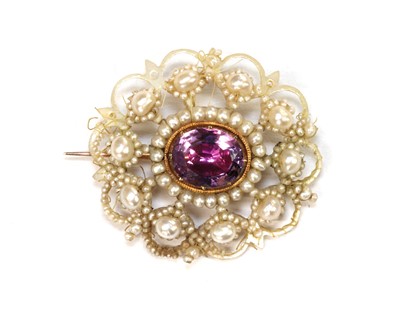 Lot 6 - A regency foiled amethyst, seed pearl and mother-of-pearl cluster brooch