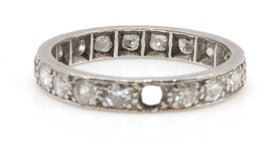 Lot 170 - A diamond set full eternity ring