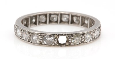 Lot 170 - A diamond set full eternity ring